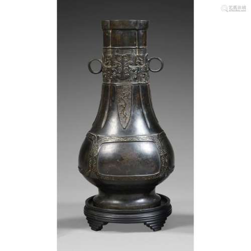 VASE WITH YEARS HU in dark patina bronze, with pol…