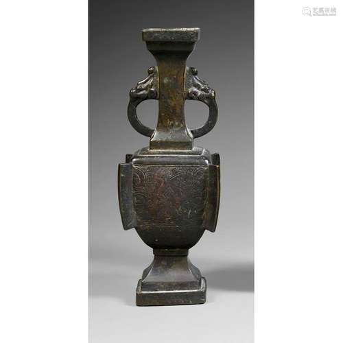 VASE WITH YEARS in dark patina bronze, the belly f…