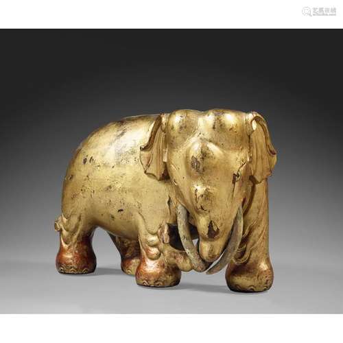 RELIEF REPRESENTING an elephant in lacquered and g…