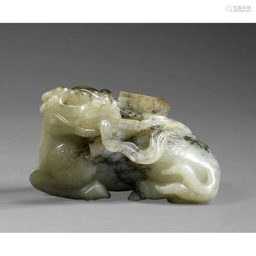 QILINEN STATUETTE OF QILINen beige nephrite jade w…