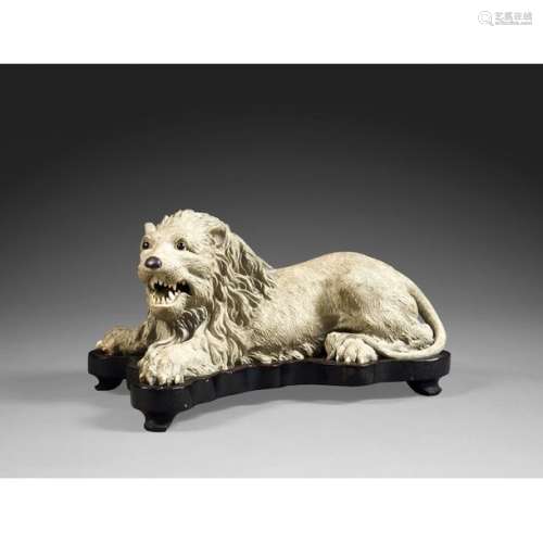 LION STATUETTE OF grey terracotta and enamel highl…