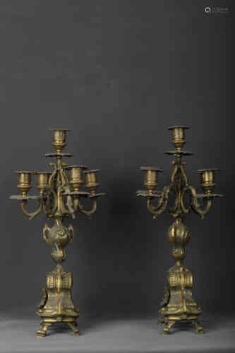 A Pair of Gilt Candle Sticks