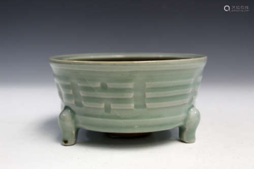 Chinese celadon porcelain tripod incense burner.