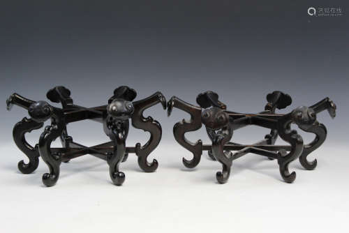 Pair of Chinese carved zitan wood stands.