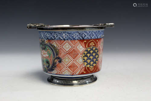 Antique Japanese hand painted porcelain bowl, made into