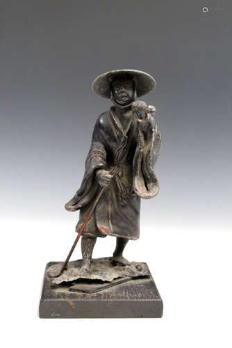 Japanese bronze figure of a fisherman.