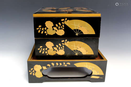 Japanese lacquer box on the stand.