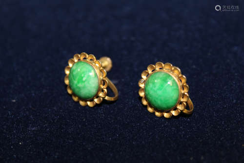 14 K gold and jadeite clip earrings.