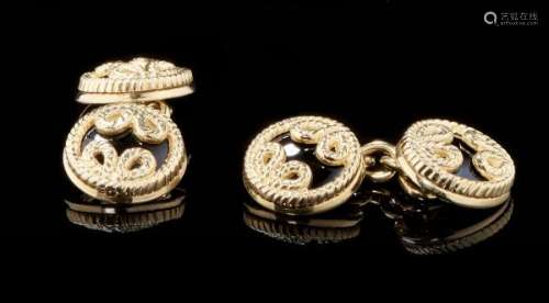 Tiffany & Co, boutons de manchette ronds sertis d'onyx - Or 750, D 14 mm, poids brut [...]