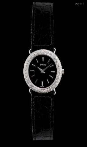 Piaget, montre ovale mécanique sertie de diamants - Cadran noir, index bâtons et [...]