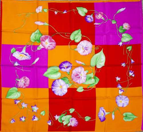 Patek Philippe, foulard à décor de fleurs sur fond violet, rouge et orange - Soie, [...]