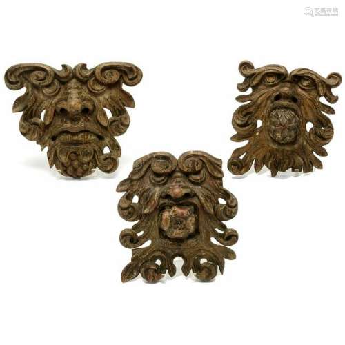 Three Baroque Style Giltwood Grotesque Masks.