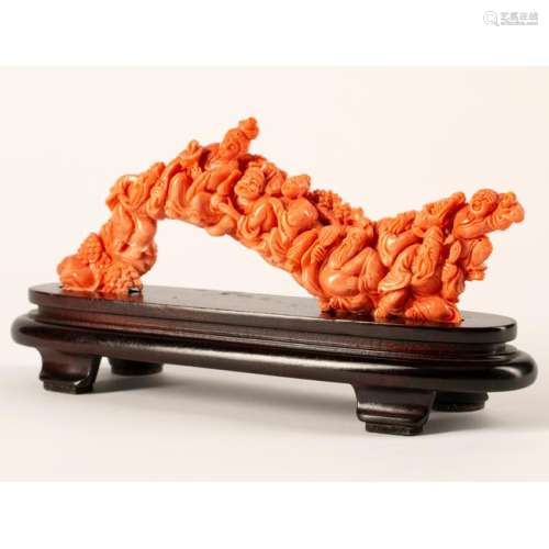Chinese Carved Coral Figural Group on a Wood Base.
