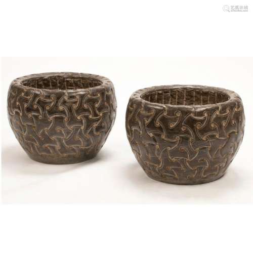 Celtic Style Carved Stone Planter Pair.