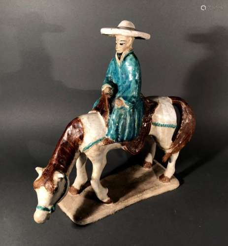 CHINE. Homme sur son cheval, céramique à couverte …