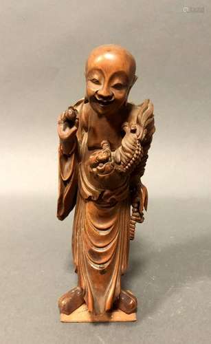 CHINE. Sage jouant avec un chien de Fô, bois sculp…