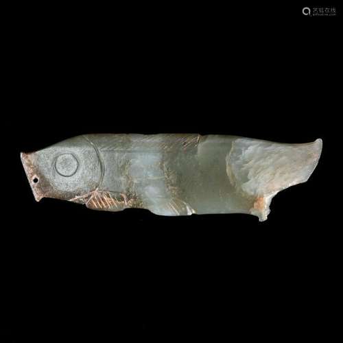 A Small Chinese Russet Jade Archaistic Fish Pendant.