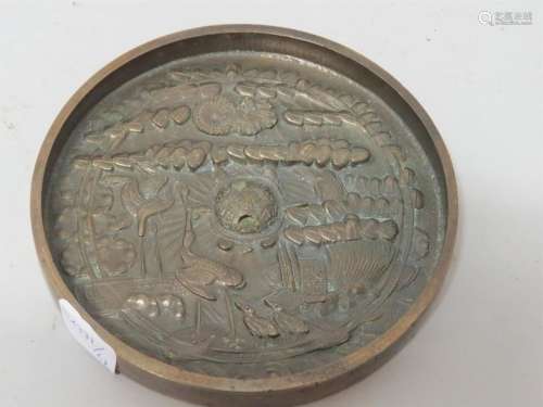 Miroir en bronze à décor d'échassiers. Japon