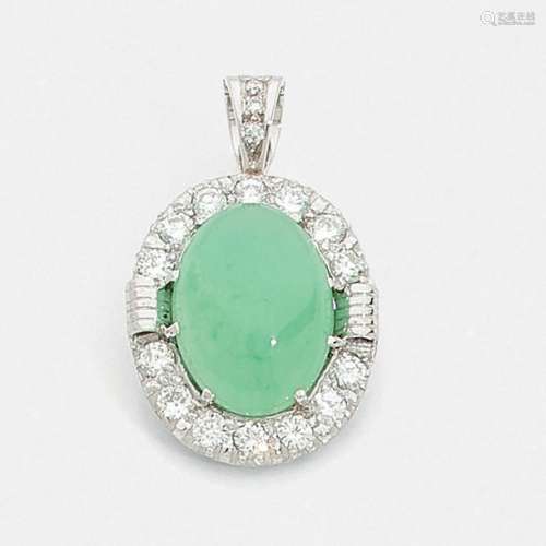 JADEIl PENDANT is oval in shape set with a jade ca…