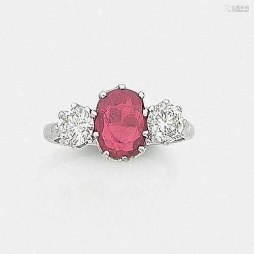 SPINEL ROUGEL RINGThe oval red spinel is framed by…
