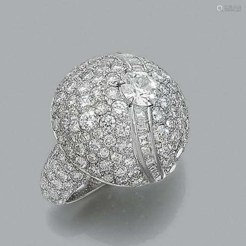 1960sImportant diamond ball ringShe wears a large …