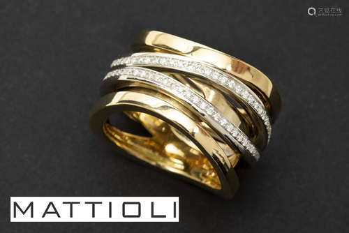 MATTIOLI ring met typisch draaimodel in wit een ge…