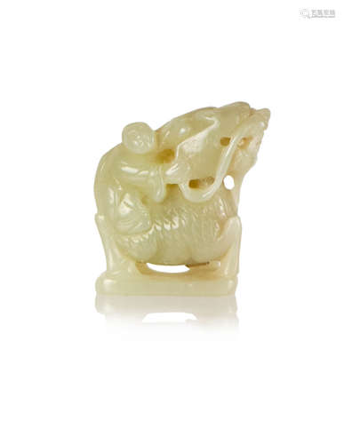 A CHINESE CARVED JADE BOY WITH QILIN