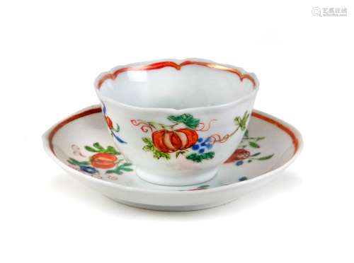 A FAMILLE ROSE CUP AND A SAUCER DISH