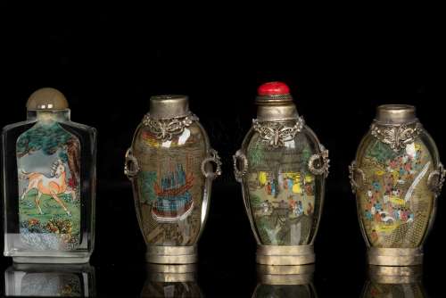 A SET OF FOUR INSIDE-PAINTED SNUFF BOTTLE
