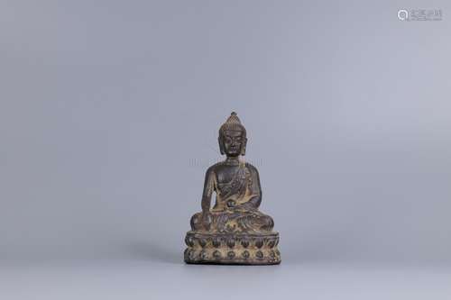 A BRONZE FIGURE OF SEATED BUDDHA