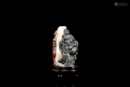 JADE CLEVERLY CARVED 'ZHU BAJIE' FIGURE