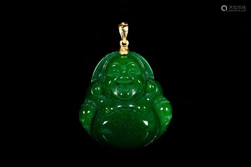 A CARVED JADE BUDDHA PENDANT