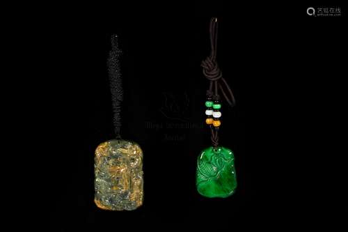 TWO CARVED JADEITE PENDANTS WITH CERTIFIED