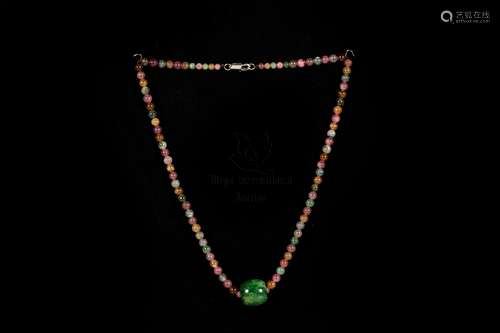 A STRING OF TOURMALINE AND JADE NECKLACE WITH AIGL CERTIFIED