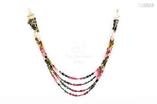 A STRING OF TOURMALINE NECKLACE