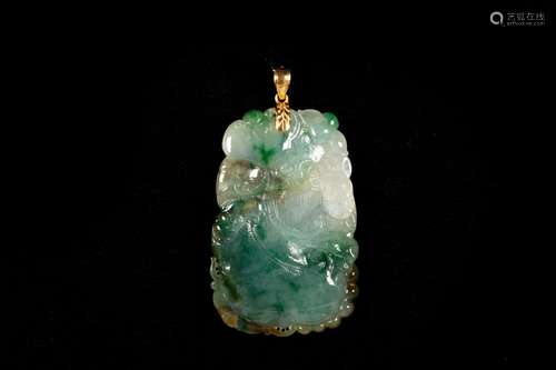 A CARVED JADEITE PENDANT OF BUDDHA