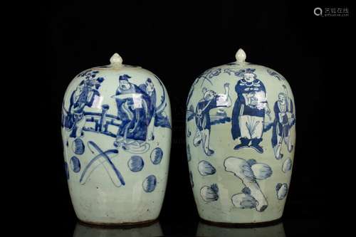 A PAIR OF BLUE AND WHITE 'FIGURAL' VASES WITH LIDS