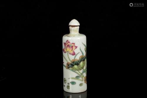 A FAMILLE ROSE MOLDED 'LOTUS' PORCELAIN SNUFF BOTTLE