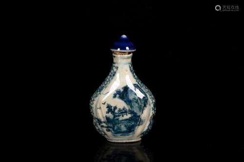 A BLUE AND WHITE MOLDED 'LANDSCAPE' PORCELAIN SNUFF BOTTLE