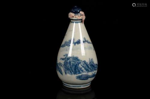 A BLUE AND WHITE MOLDED 'LANDSCAPE' PORCELAIN SNUFF BOTTLE