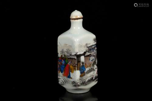 A FAMILLE ROSE MOLDED PORCELAIN SNUFF BOTTLE