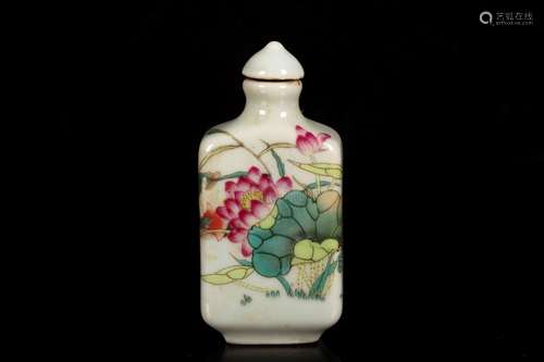 A FAMILLE ROSE MOLDED 'LOTUS' PORCELAIN SNUFF BOTTLE