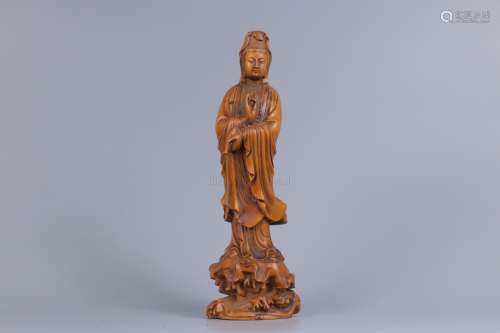 A CARVED BOXWOOD FIGURE OF GUANYIN