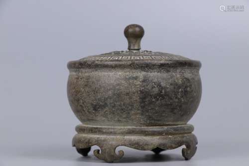 A BRONZE CENSER WITH COVER