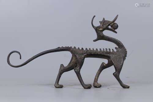 A BRONZE MODEL OF DRAGON