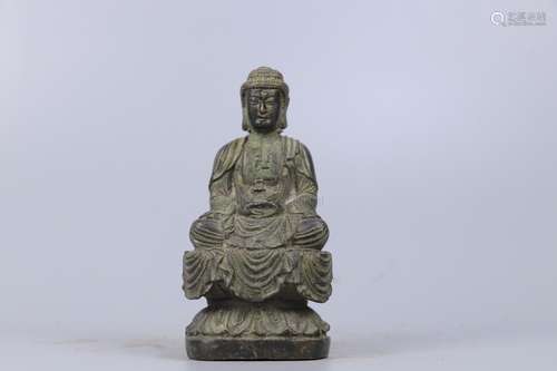 A BRONZE FIGURE OF SHAKYAMUNI