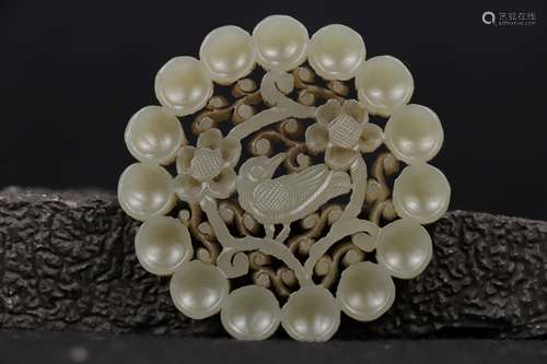 A WHITE JADE OPENWORK 'FLOWER AND BIRD' PLAQUE