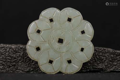 A CARVED WHITE JADE PLAQUE