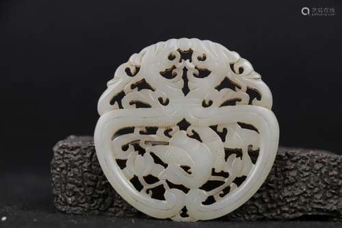 A WHITE JADE OPENWORK 'FLOWER AND BIRD' PLAQUE