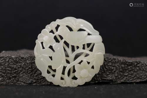 A WHITE JADE OPENWORK 'FLOWER AND BIRD' PLAQUE